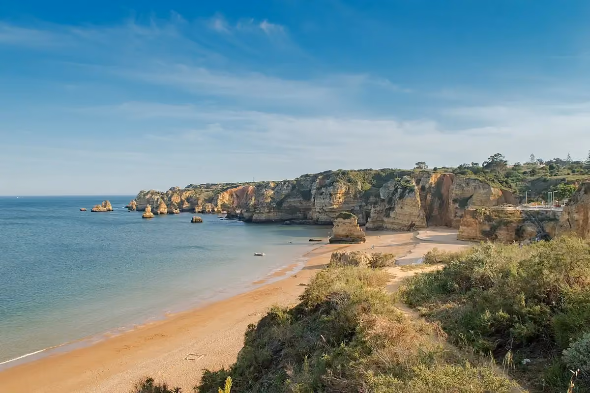 Praia Dona Ana’s sand and cliffs near Lagos in Portugal