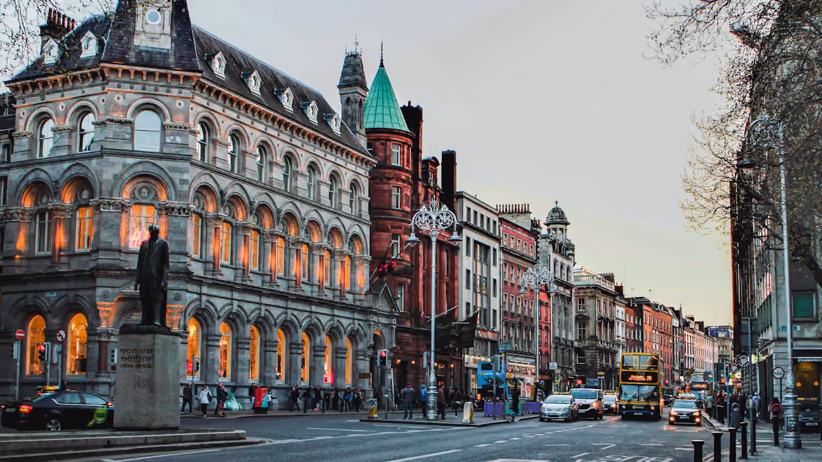Historic corner building and clock tower on a Dublin street