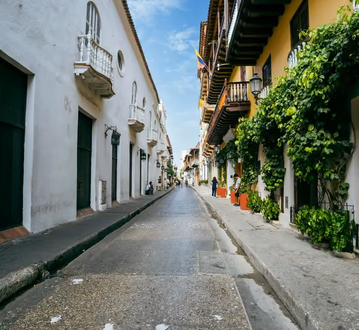 Colorful colonial buildings and balconies along a street in Cartagena