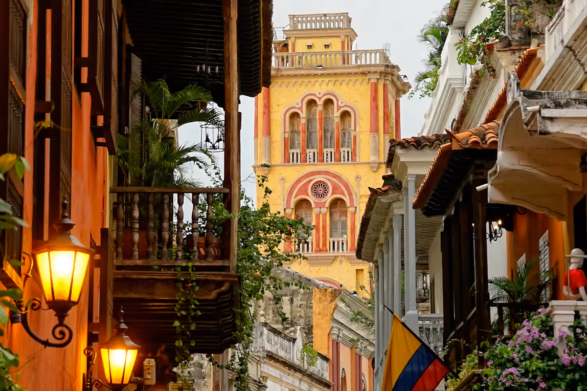 Colorful colonial buildings and a church tower in Cartagena