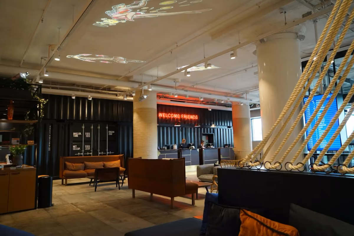 Reception desk and seating in a hotel lobby