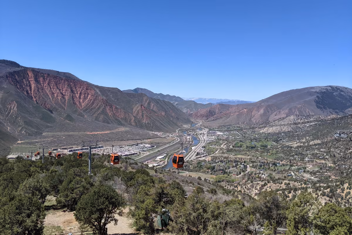 Glenwood Springs buildings in a mountain valley on a clear day
