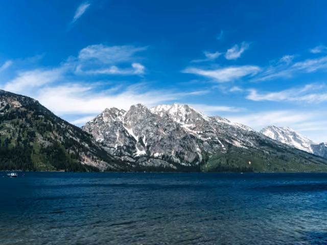 An alpine lake beneath the mountains in Grand Teton National Park