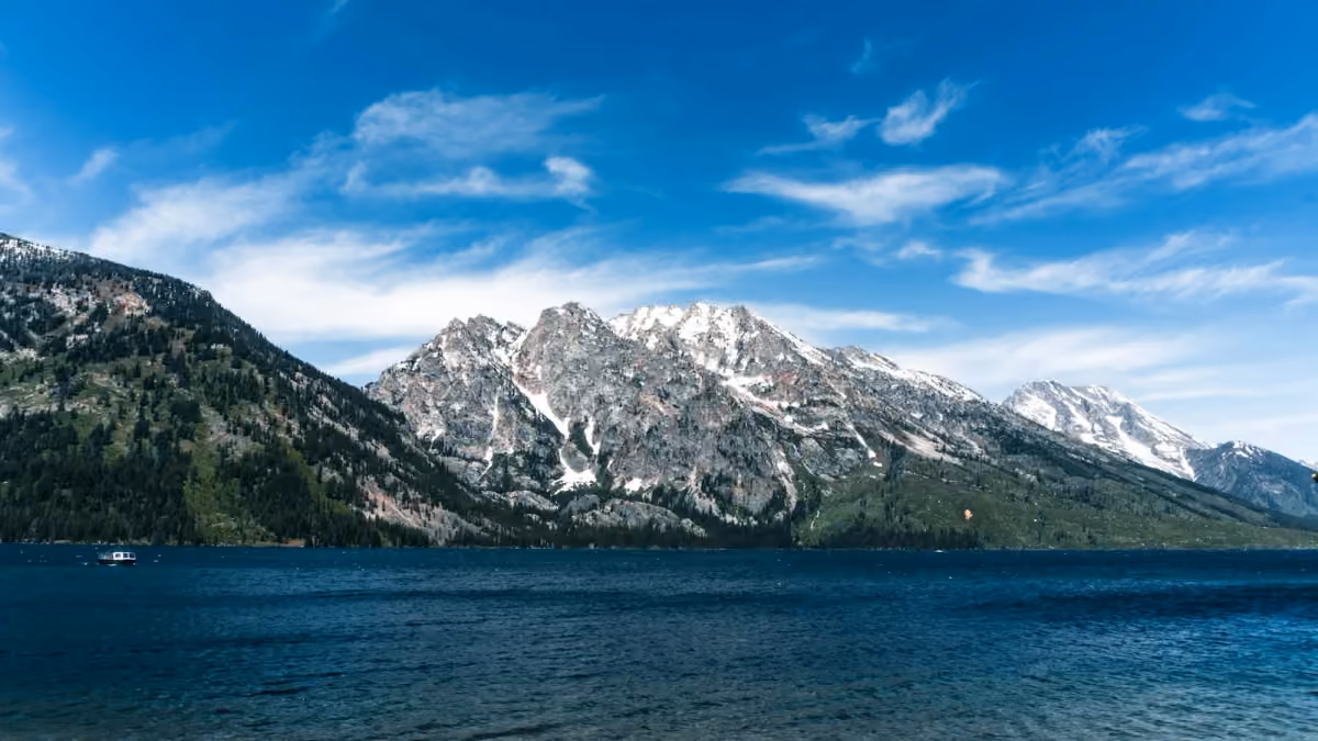 An alpine lake beneath the mountains in Grand Teton National Park